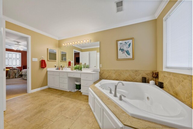 266 Campground Rd, Olmstead, KY 42265 - ensuite bathroom with double vanity, a jetted tub, ornamental molding, and a ceiling fan