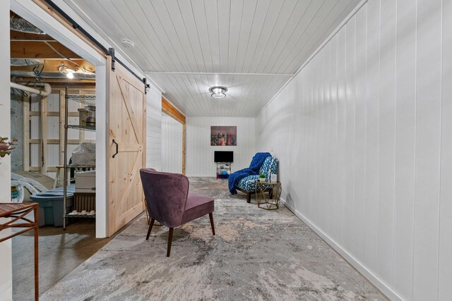 266 Campground Rd, Olmstead, KY 42265 - living area featuring a barn door and concrete flooring