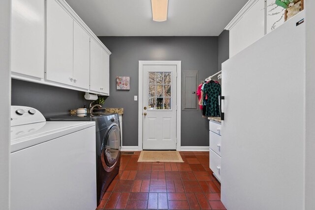 266 Campground Rd, Olmstead, KY 42265 - laundry area featuring washing machine and dryer, brick floors, cabinet space, baseboards, and electric panel