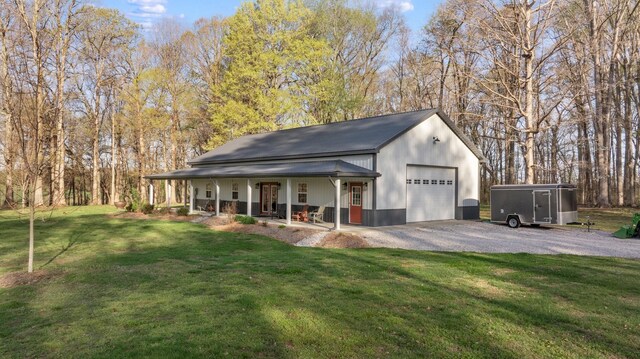 266 Campground Rd, Olmstead, KY 42265 - view of front facade featuring a porch, a front yard, metal roof, and driveway