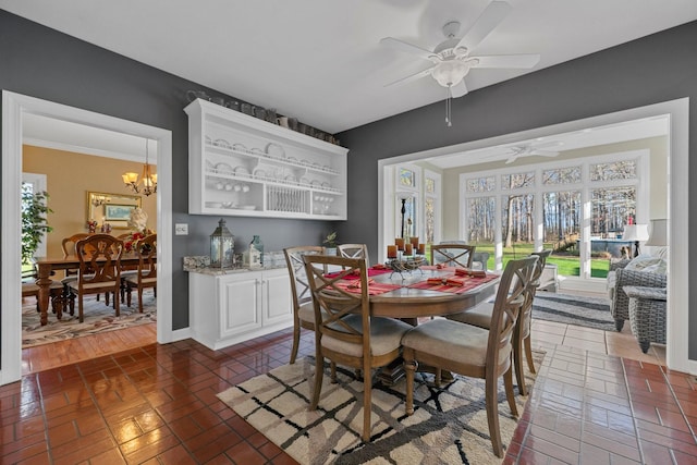266 Campground Rd, Olmstead, KY 42265 - dining area with ceiling fan and a chandelier