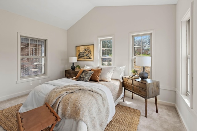 151 John D St, La Vergne, TN 37086 - bedroom with light carpet, vaulted ceiling, and baseboards