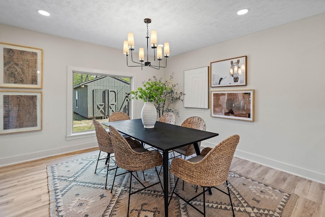 151 John D St, La Vergne, TN 37086 - dining space with a chandelier, a textured ceiling, baseboards, light wood-type flooring, and recessed lighting