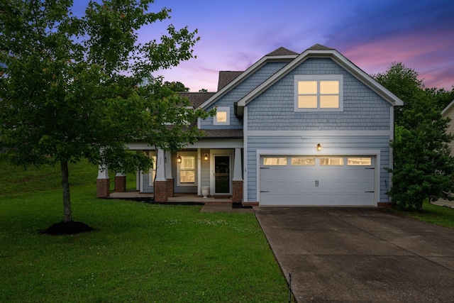 503 Whirlaway Ct, Burns, TN 37029 - view of front of property with a porch, concrete driveway, a front yard, and a garage