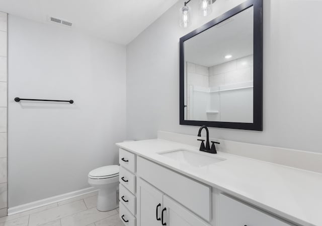 264 Kildeer Dr, Clarksville, TN 37040 - bathroom with vanity, toilet, marble finish floors, baseboards, and a shower