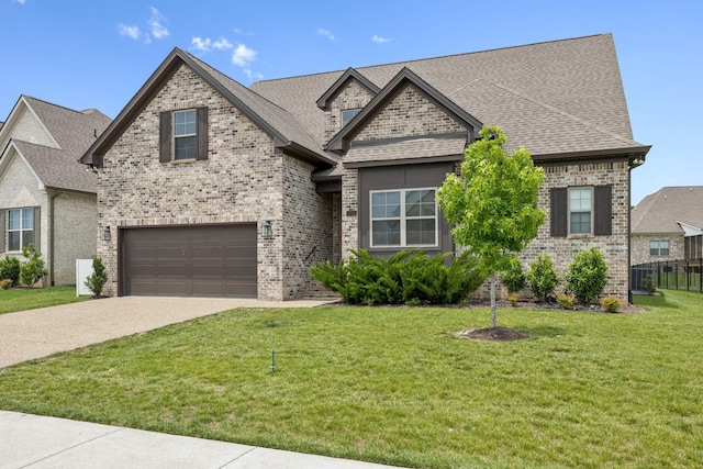 1712 Sorrell Park Dr, Spring Hill, TN 37174 - french country style house with brick siding, a garage, driveway, and a shingled roof