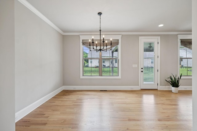 1712 Sorrell Park Dr, Spring Hill, TN 37174 - unfurnished dining area featuring ornamental molding, a chandelier, light wood-style floors, baseboards, and recessed lighting