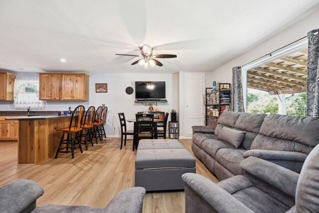 1540 Centerville Hwy, Hohenwald, TN 38462 - living room featuring ceiling fan and light wood-type flooring
