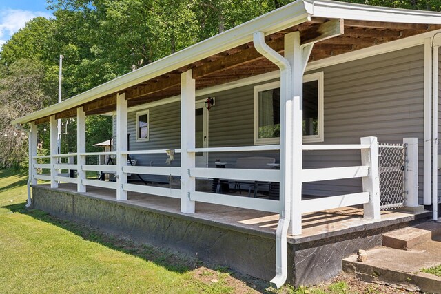 1540 Centerville Hwy, Hohenwald, TN 38462 - wooden deck featuring a lawn