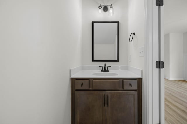 174 Oak St, Clarksville, TN 37042 - bathroom with vanity, wood finished floors, and baseboards
