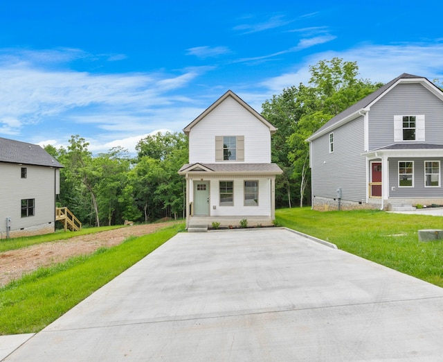 174 Oak St, Clarksville, TN 37042 - view of front facade featuring concrete driveway and a front yard