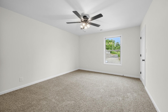 174 Oak St, Clarksville, TN 37042 - carpeted spare room with baseboards and a ceiling fan