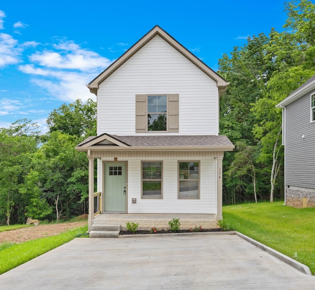 174 Oak St, Clarksville, TN 37042 - view of front of house featuring a porch, a front yard, and roof with shingles
