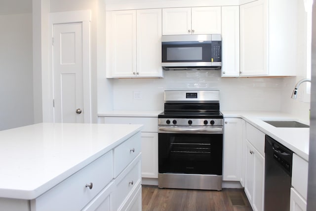 2513 Hickory Dr, Springfield, TN 37172 - kitchen with stainless steel appliances, a sink, and white cabinets