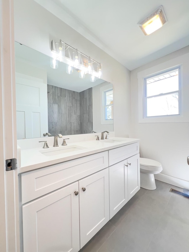 2513 Hickory Dr, Springfield, TN 37172 - bathroom featuring double vanity, tile patterned flooring, and toilet