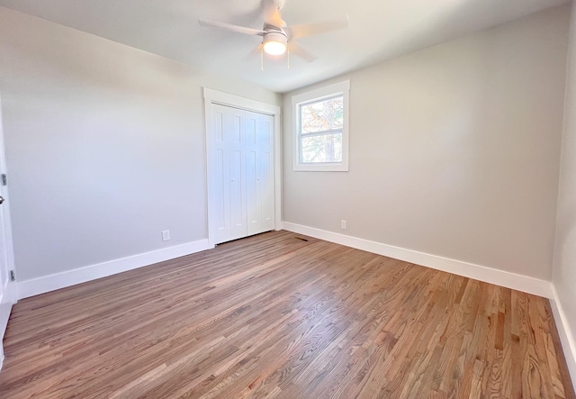 2513 Hickory Dr, Springfield, TN 37172 - unfurnished bedroom with baseboards, light wood-type flooring, and a closet