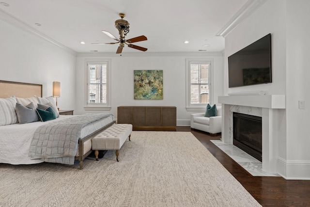100 Church St, Franklin, TN 37064 - bedroom with multiple windows, wood finished floors, crown molding, a premium fireplace, and baseboards