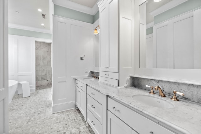 100 Church St, Franklin, TN 37064 - full bath featuring double vanity, a soaking tub, tiled shower, crown molding, and recessed lighting