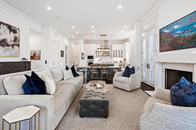 100 Church St, Franklin, TN 37064 - living room with crown molding, a premium fireplace, and recessed lighting