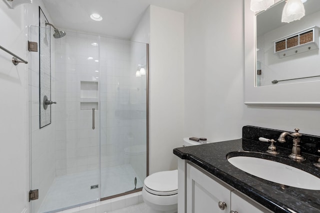 100 Church St, Franklin, TN 37064 - bathroom with toilet, vanity, a stall shower, and recessed lighting