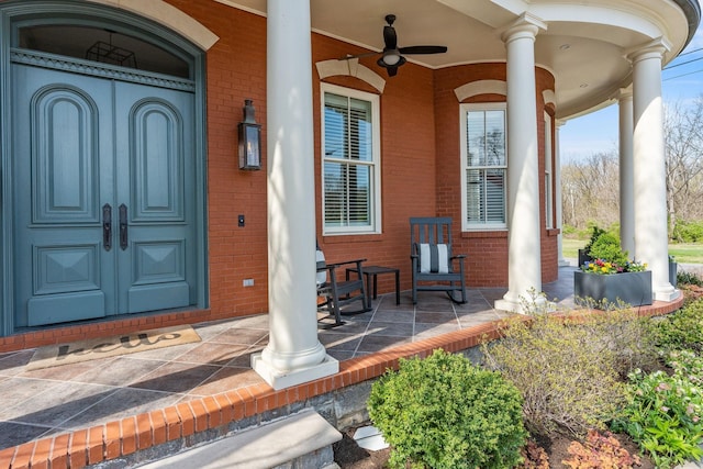 100 Church St, Franklin, TN 37064 - doorway to property with a porch and brick siding