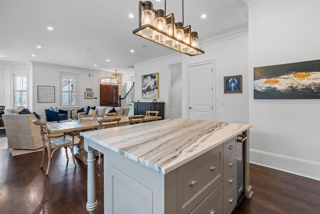 100 Church St, Franklin, TN 37064 - kitchen with crown molding, gray cabinets, dark wood-style flooring, open floor plan, and recessed lighting