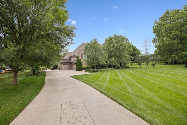 2433 Durham Manor Dr, Franklin, TN 37064 - view of front of home featuring a front lawn, driveway, and a garage