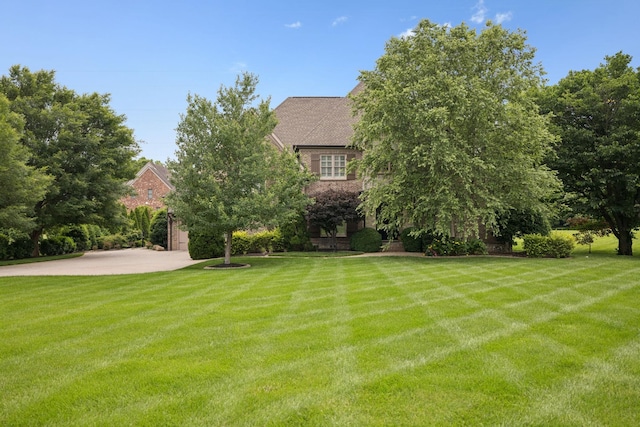 2433 Durham Manor Dr, Franklin, TN 37064 - view of front facade featuring a front yard