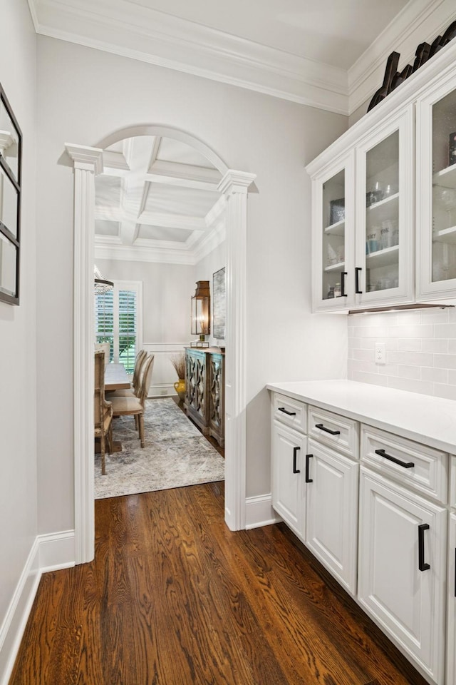2433 Durham Manor Dr, Franklin, TN 37064 - corridor featuring dark wood finished floors, coffered ceiling, ornamental molding, decorative columns, and beam ceiling