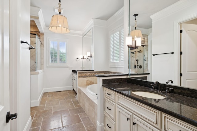 2433 Durham Manor Dr, Franklin, TN 37064 - bathroom with stone tile flooring, a tile shower, vanity, a bath, and ornamental molding