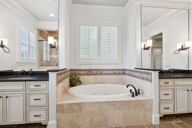 2433 Durham Manor Dr, Franklin, TN 37064 - bathroom with a jetted tub, two vanities, and ornamental molding
