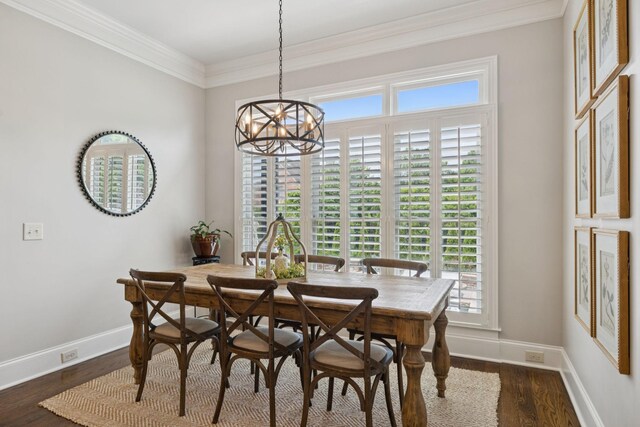 2433 Durham Manor Dr, Franklin, TN 37064 - dining room featuring crown molding, a chandelier, dark wood-style floors, and baseboards