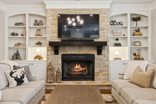 2433 Durham Manor Dr, Franklin, TN 37064 - living room with ornamental molding, a stone fireplace, built in features, and wood finished floors