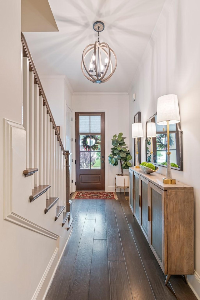 5540 Knob Rd, Nashville, TN 37209 - foyer with a chandelier, stairway, dark wood-style floors, crown molding, and baseboards