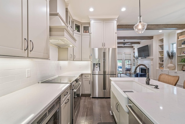5540 Knob Rd, Nashville, TN 37209 - kitchen with appliances with stainless steel finishes, custom range hood, dark wood-style floors, light countertops, and recessed lighting