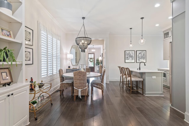 5540 Knob Rd, Nashville, TN 37209 - dining space with crown molding, a chandelier, baseboards, healthy amount of natural light, and recessed lighting