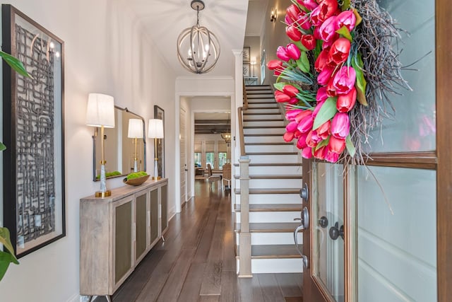 5540 Knob Rd, Nashville, TN 37209 - foyer with a chandelier, wood finished floors, stairway, ornamental molding, and baseboards