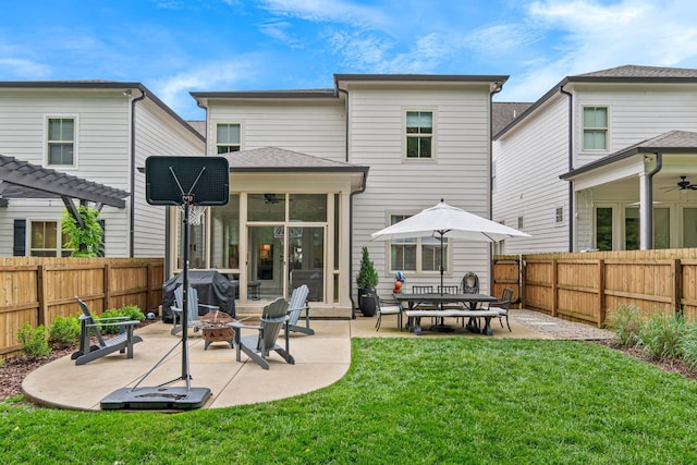 5540 Knob Rd, Nashville, TN 37209 - back of house featuring ceiling fan, a sunroom, a patio, an outdoor fire pit, and a pergola