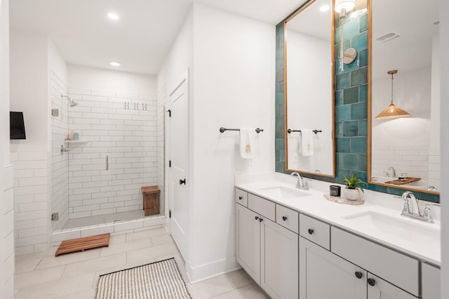 4042 Flowing Creek Dr, Franklin, TN 37064 - full bathroom featuring double vanity, a stall shower, tile patterned floors, recessed lighting, and baseboards