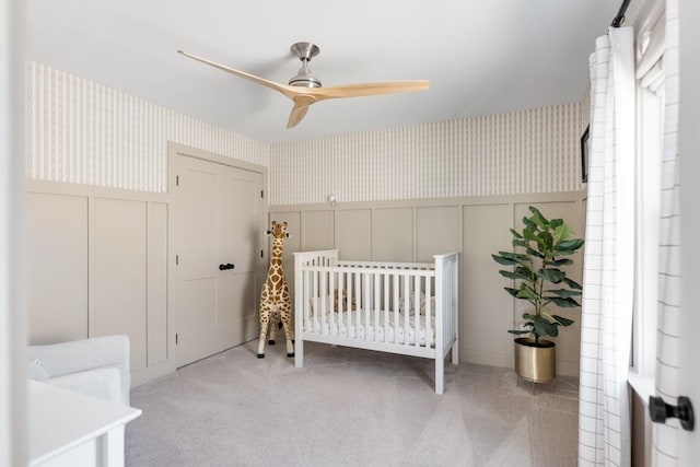 4042 Flowing Creek Dr, Franklin, TN 37064 - bedroom with a decorative wall, wallpapered walls, carpet flooring, wainscoting, and a closet