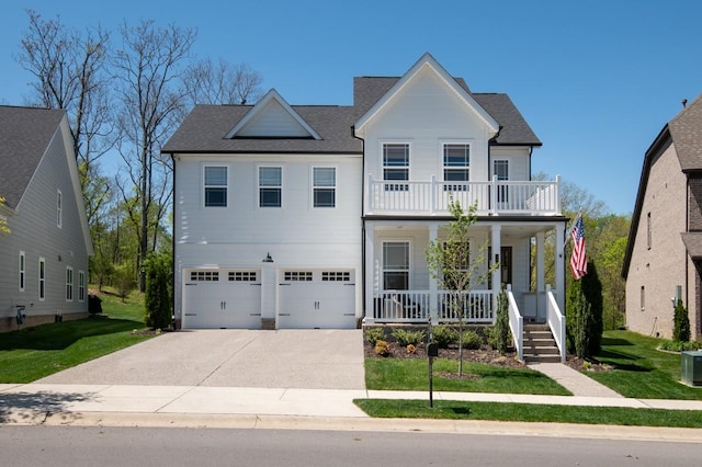 4042 Flowing Creek Dr, Franklin, TN 37064 - view of front of home with covered porch, driveway, a garage, and a front yard