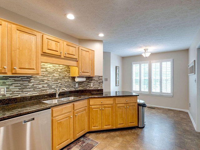 2999 Cages Bend Rd, Gallatin, TN 37066 - kitchen featuring dishwasher, a sink, a peninsula, backsplash, and a textured ceiling
