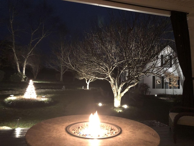 2999 Cages Bend Rd, Gallatin, TN 37066 - patio at night with an outdoor fire pit