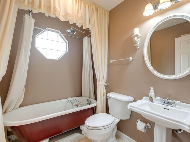 2999 Cages Bend Rd, Gallatin, TN 37066 - full bathroom with toilet, a sink, and baseboards