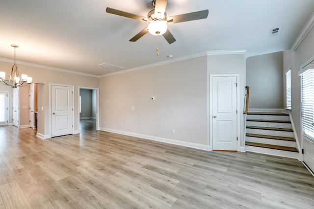 3254 Tasker Dr, Antioch, TN 37013 - unfurnished living room with stairway, ornamental molding, a ceiling fan, light wood-style floors, and a chandelier