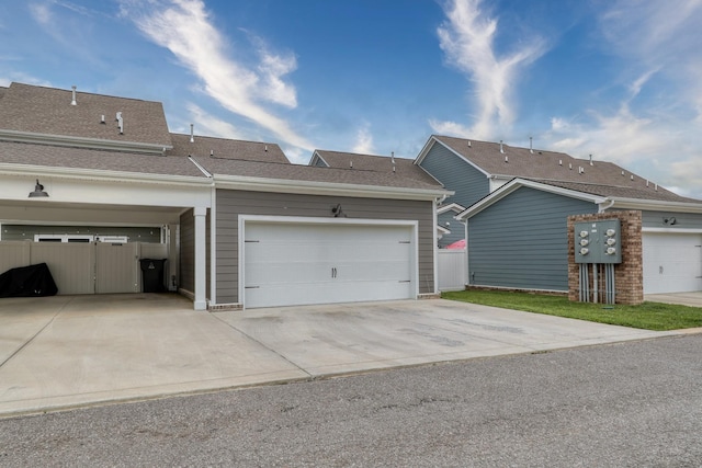 3254 Tasker Dr, Antioch, TN 37013 - rear view of property featuring driveway and an attached garage