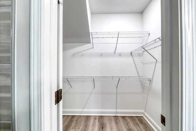 3254 Tasker Dr, Antioch, TN 37013 - spacious closet featuring wood finished floors