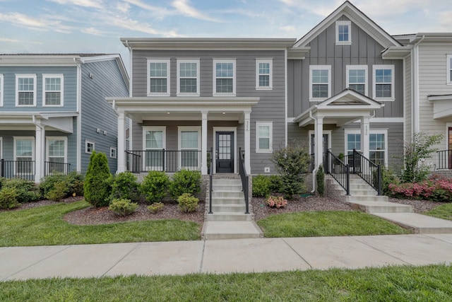3254 Tasker Dr, Antioch, TN 37013 - townhome / multi-family property with board and batten siding and covered porch