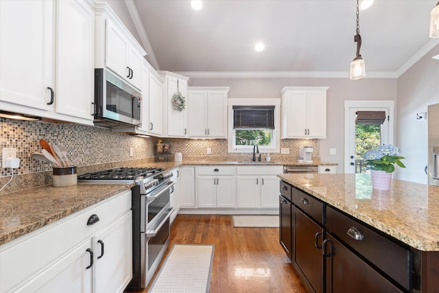 441 Highpoint Ter, Brentwood, TN 37027 - kitchen with appliances with stainless steel finishes, a sink, white cabinets, crown molding, and decorative backsplash
