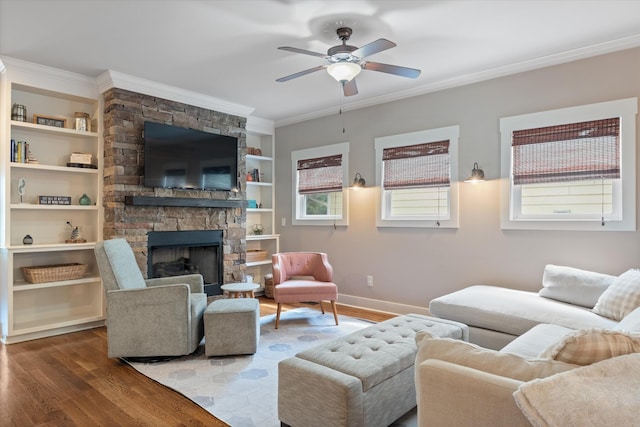 441 Highpoint Ter, Brentwood, TN 37027 - living area featuring wood finished floors, crown molding, healthy amount of natural light, a fireplace, and ceiling fan